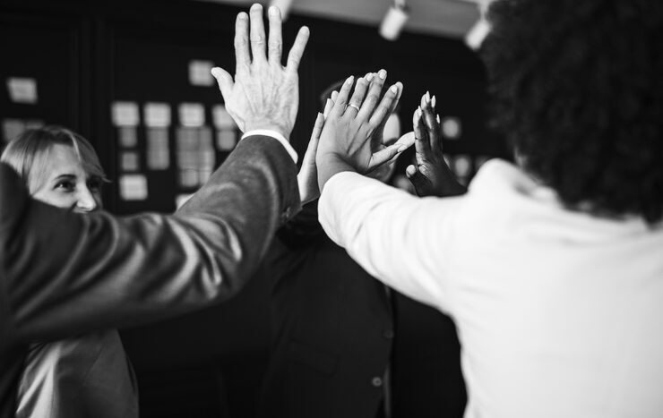 business-team-giving-high-five_53876-15183