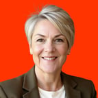 elx-libby-koehn-headshot-2026-ai-red-bg